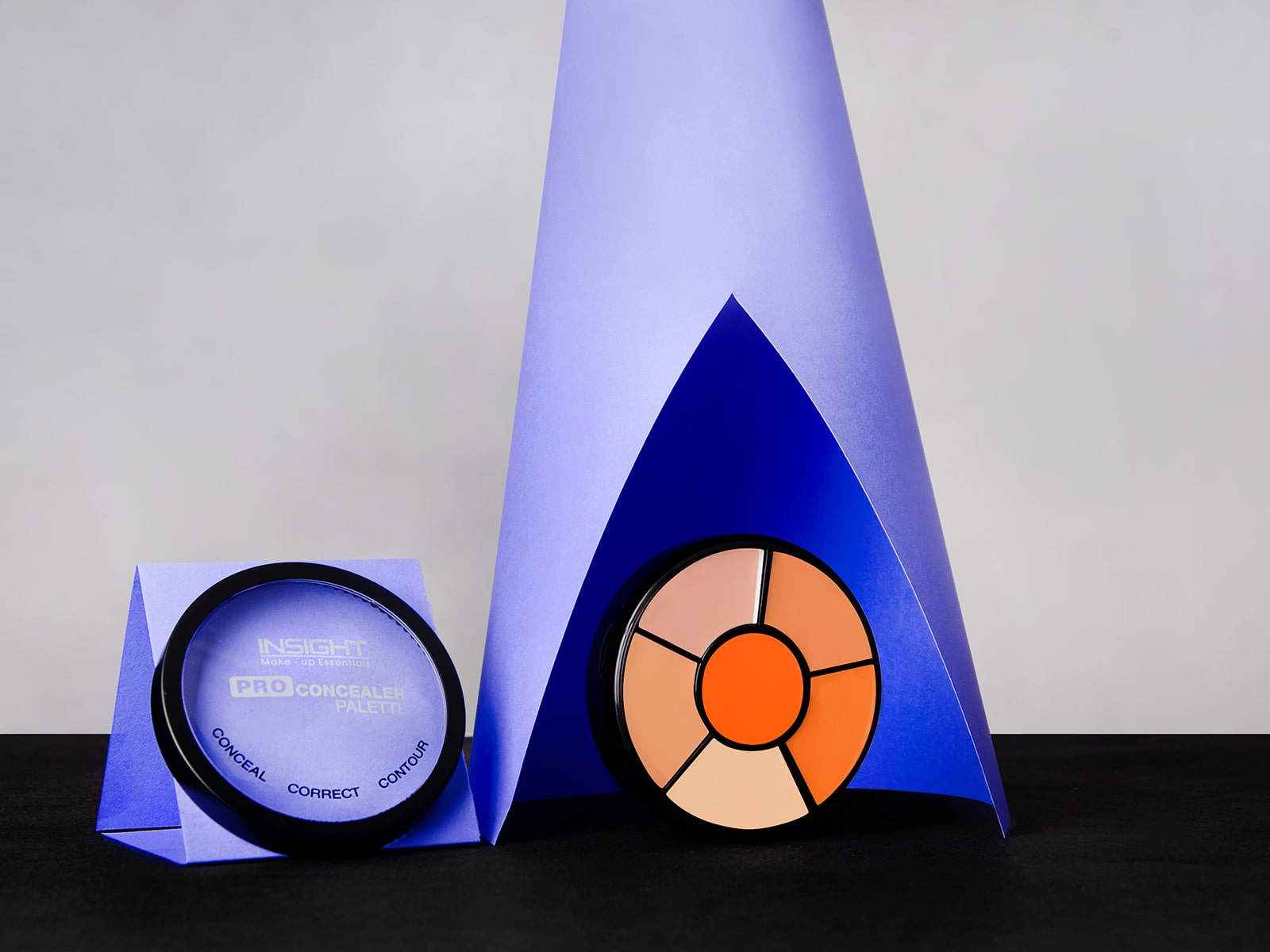 Beauty product flatlay with small makeup kit in Mumbai studio